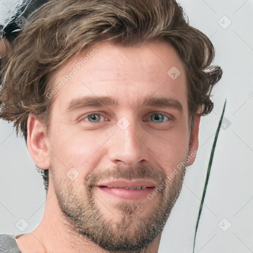 Joyful white young-adult male with short  brown hair and blue eyes