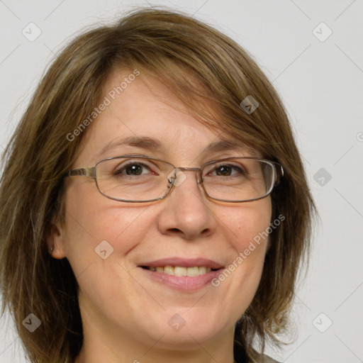 Joyful white adult female with medium  brown hair and green eyes