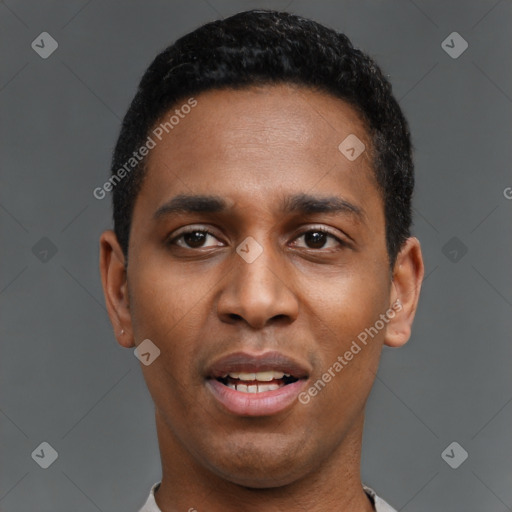 Joyful latino young-adult male with short  black hair and brown eyes