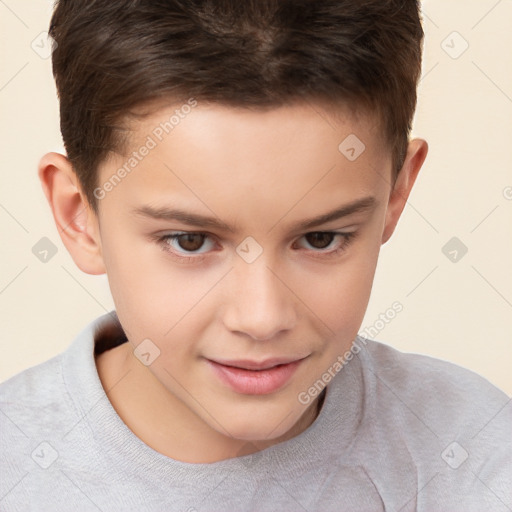 Joyful white child male with short  brown hair and brown eyes