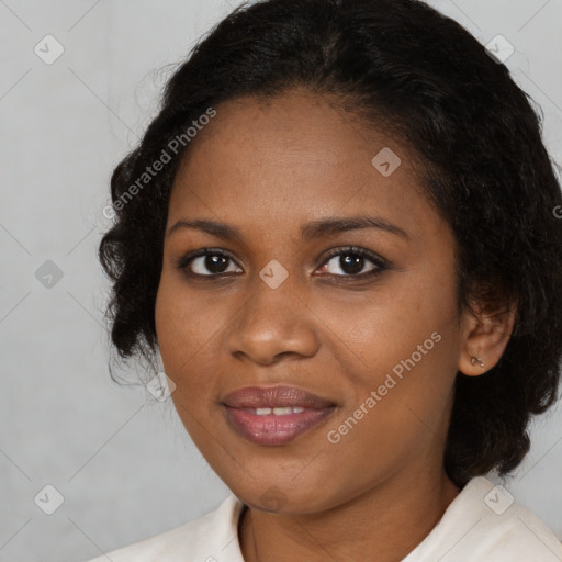 Joyful black young-adult female with medium  brown hair and brown eyes