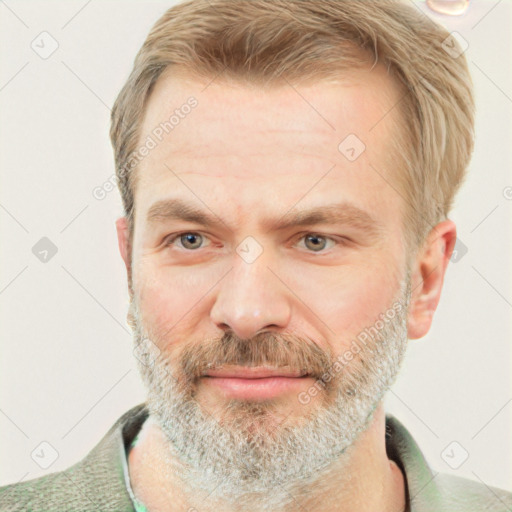 Joyful white adult male with short  brown hair and grey eyes