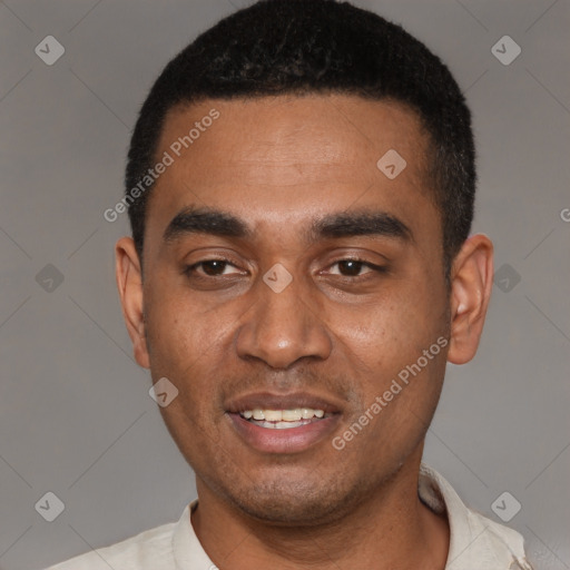 Joyful black young-adult male with short  black hair and brown eyes