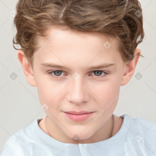 Joyful white child male with short  brown hair and brown eyes