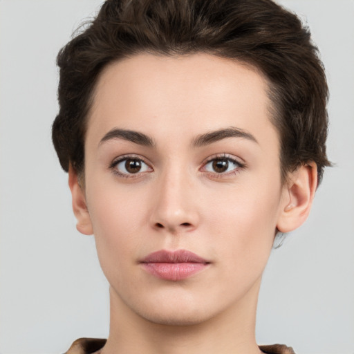 Neutral white young-adult female with short  brown hair and brown eyes