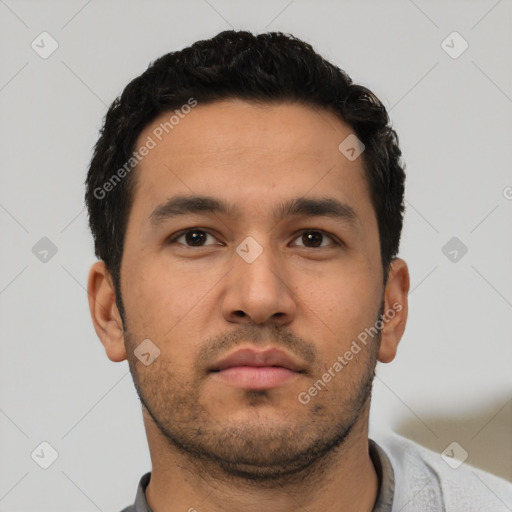Neutral latino young-adult male with short  black hair and brown eyes