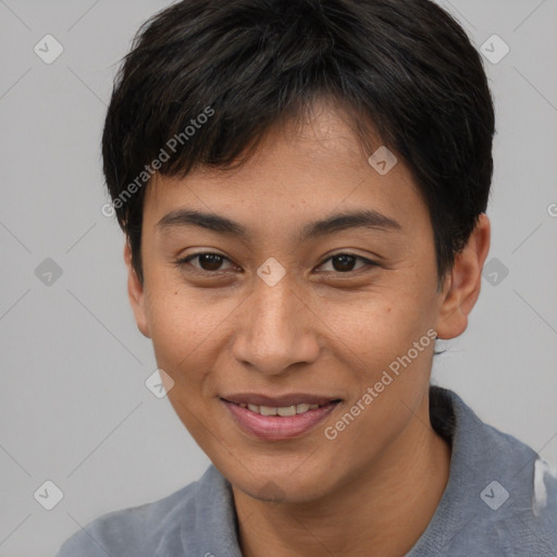 Joyful asian young-adult female with short  brown hair and brown eyes