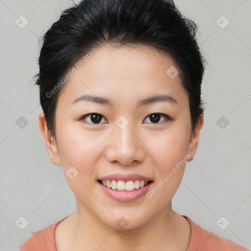 Joyful asian young-adult female with short  brown hair and brown eyes