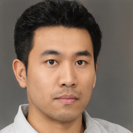 Neutral asian young-adult male with short  black hair and brown eyes