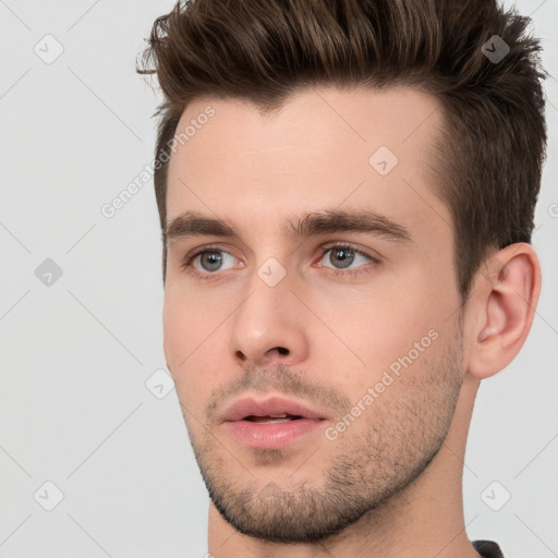 Neutral white young-adult male with short  brown hair and brown eyes