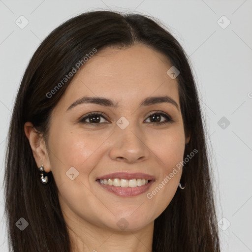 Joyful white young-adult female with long  brown hair and brown eyes