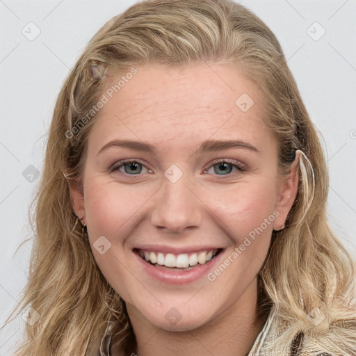 Joyful white young-adult female with long  brown hair and blue eyes