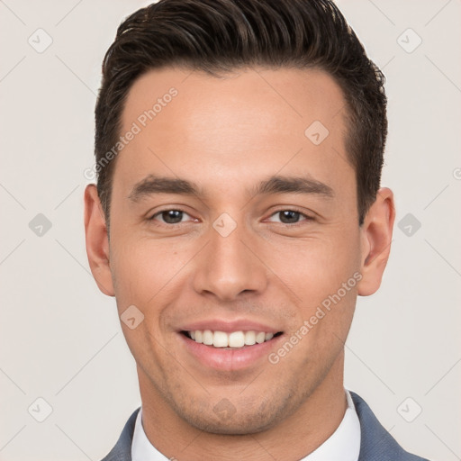 Joyful white young-adult male with short  brown hair and brown eyes