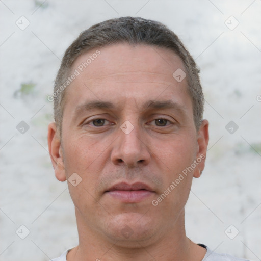 Neutral white adult male with short  brown hair and brown eyes