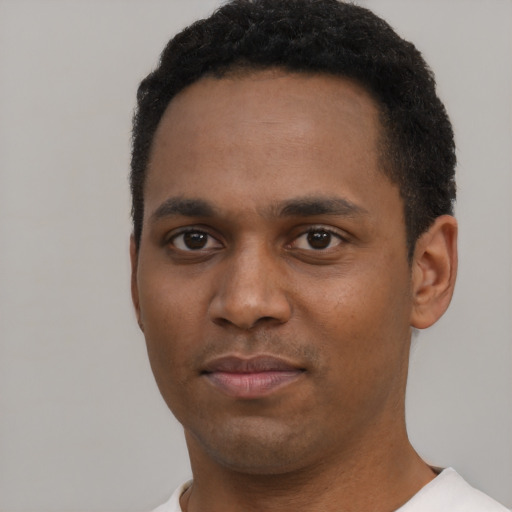 Neutral black young-adult male with short  black hair and brown eyes