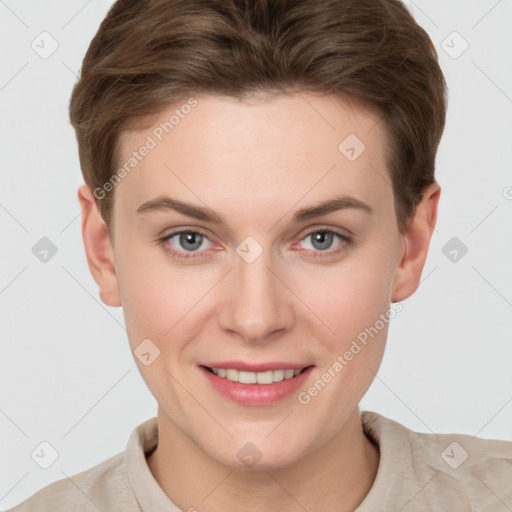 Joyful white young-adult female with short  brown hair and grey eyes