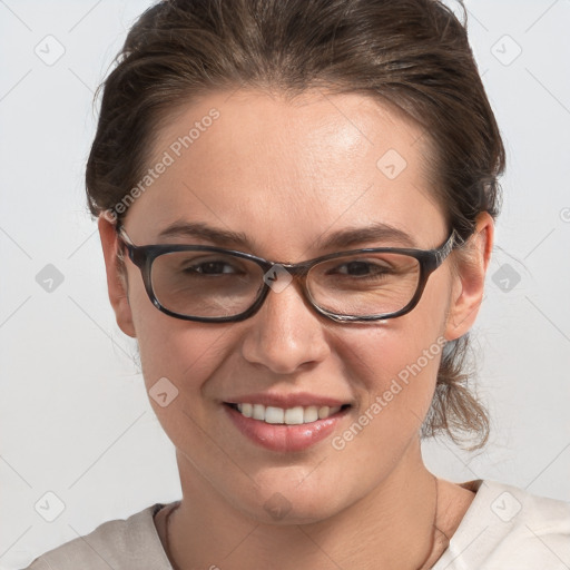 Joyful white young-adult female with medium  brown hair and blue eyes