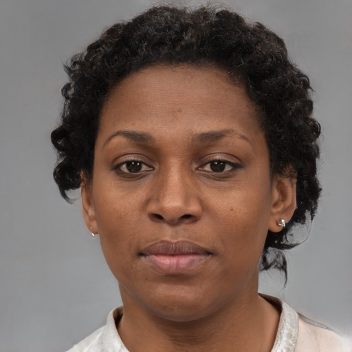 Neutral black young-adult female with short  brown hair and brown eyes