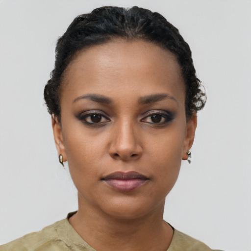 Neutral black young-adult female with short  black hair and brown eyes