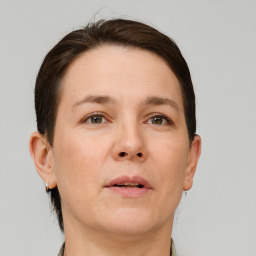 Neutral white adult female with short  brown hair and brown eyes