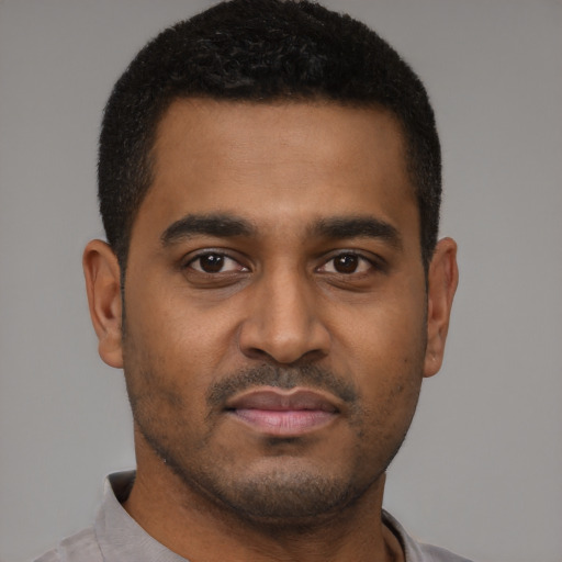 Neutral black young-adult male with short  black hair and brown eyes