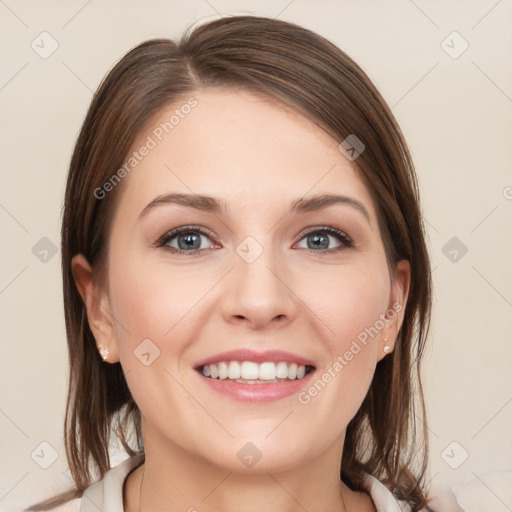 Joyful white young-adult female with medium  brown hair and blue eyes