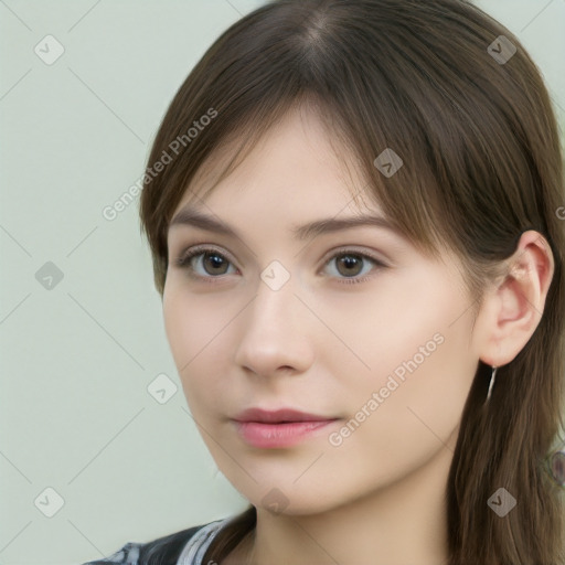 Neutral white young-adult female with long  brown hair and brown eyes