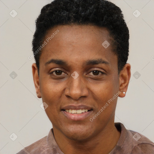 Joyful black young-adult male with short  black hair and brown eyes