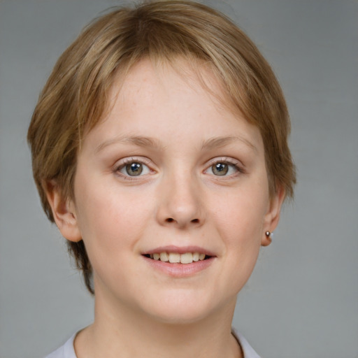 Joyful white young-adult female with short  brown hair and grey eyes