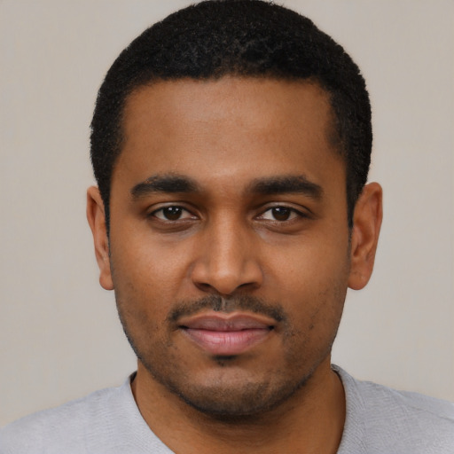 Neutral black young-adult male with short  black hair and brown eyes