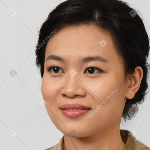 Joyful asian young-adult female with medium  brown hair and brown eyes