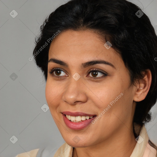 Joyful latino young-adult female with medium  brown hair and brown eyes