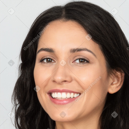 Joyful white young-adult female with long  black hair and brown eyes