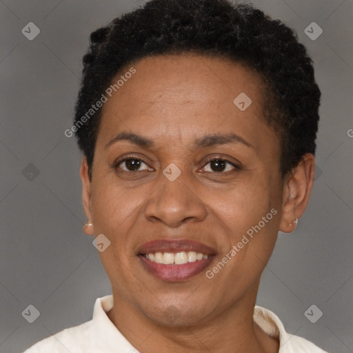 Joyful latino adult female with short  brown hair and brown eyes