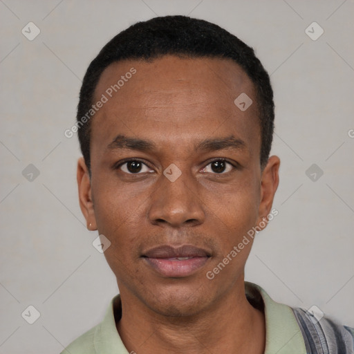 Neutral black young-adult male with short  black hair and brown eyes