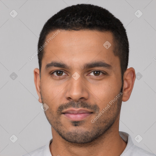 Neutral latino young-adult male with short  black hair and brown eyes