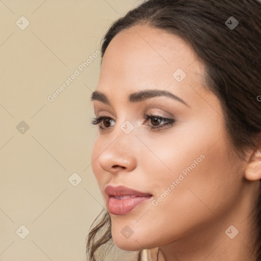 Neutral white young-adult female with long  brown hair and brown eyes