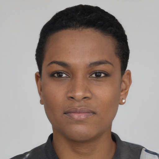 Neutral black young-adult female with short  black hair and brown eyes
