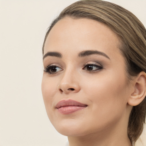 Neutral white young-adult female with medium  brown hair and brown eyes