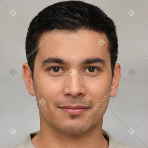 Joyful white young-adult male with short  black hair and brown eyes