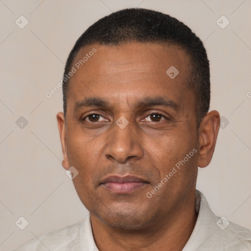 Neutral black adult male with short  black hair and brown eyes