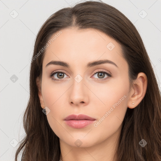 Neutral white young-adult female with long  brown hair and brown eyes