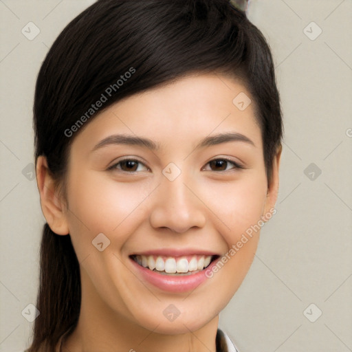 Joyful white young-adult female with long  black hair and brown eyes