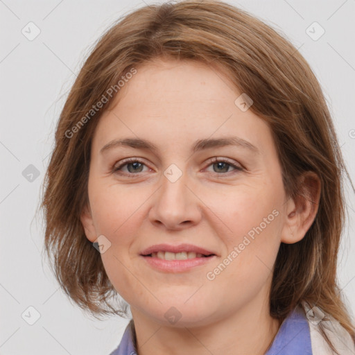 Joyful white young-adult female with medium  brown hair and blue eyes