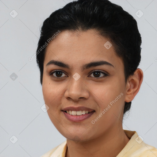 Joyful latino young-adult female with short  black hair and brown eyes