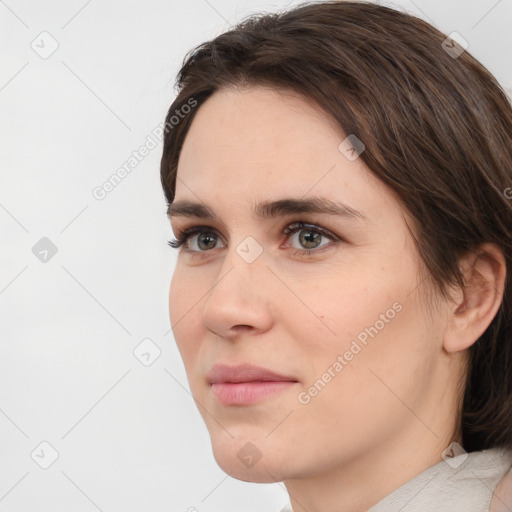 Neutral white young-adult female with short  brown hair and brown eyes