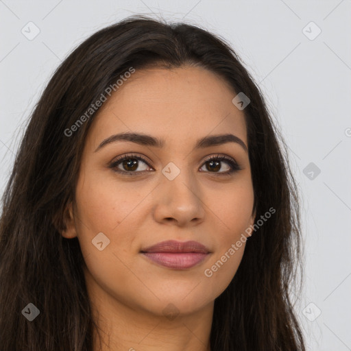 Joyful latino young-adult female with long  brown hair and brown eyes