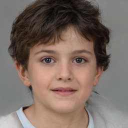 Joyful white child female with short  brown hair and brown eyes