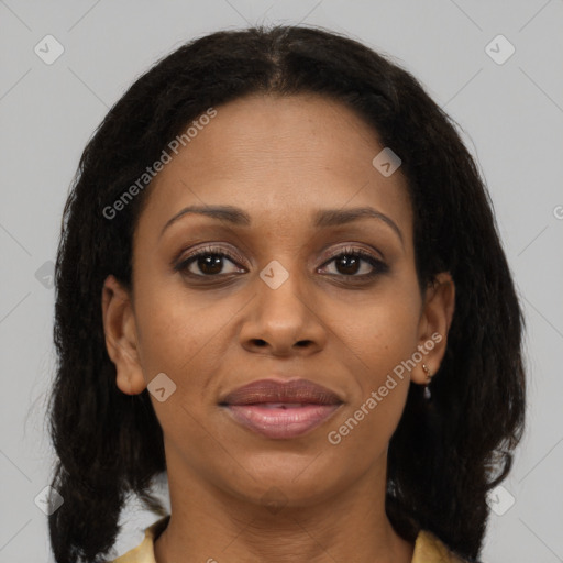 Joyful black young-adult female with medium  brown hair and brown eyes