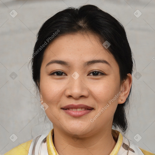 Joyful asian young-adult female with medium  brown hair and brown eyes